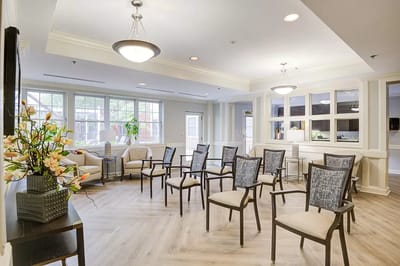 Common area with chairs and natural light