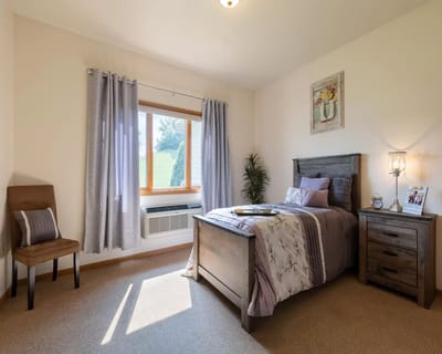 Cozy private room with a bed and window