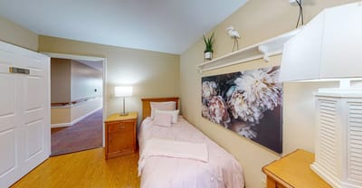 Cozy private room with floral decor and warm lighting
