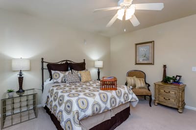 Interior of a cozy resident bedroom with decor
