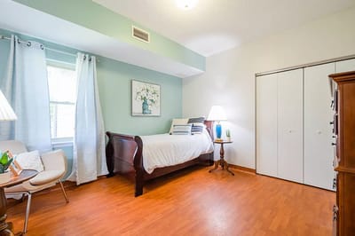 Bright, furnished resident room with modern decor