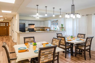 Bright dining area with tables set for meals