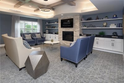 Interior common area with seating and fireplace