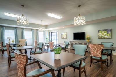 Bright common area with decorative lighting and furniture