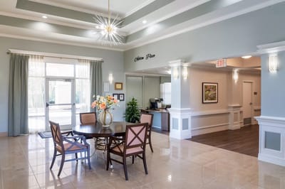 Bright common area with seating and decor