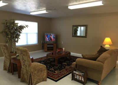 Common area with seating and television
