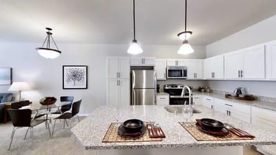 Modern kitchen area inside a senior living apartment
