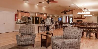 Common area with seating and residents