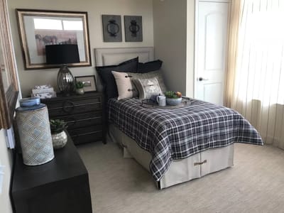 Cozy resident bedroom with decor and furnishings