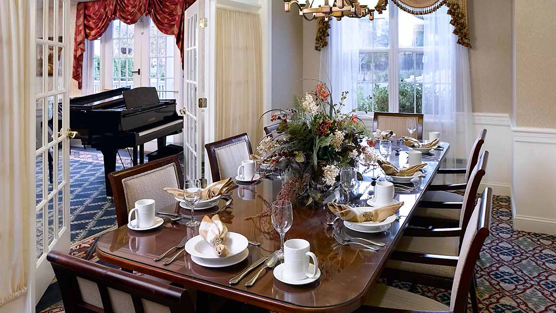 Bright dining room set up for a meal