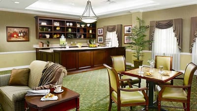 Interior lounge area with seating and refreshments