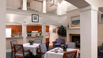 Elegant dining area with tables and flowers