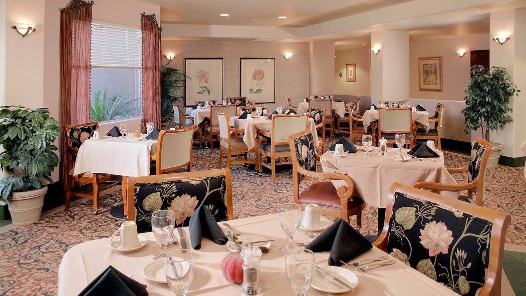 Dining room with decorated tables and chairs