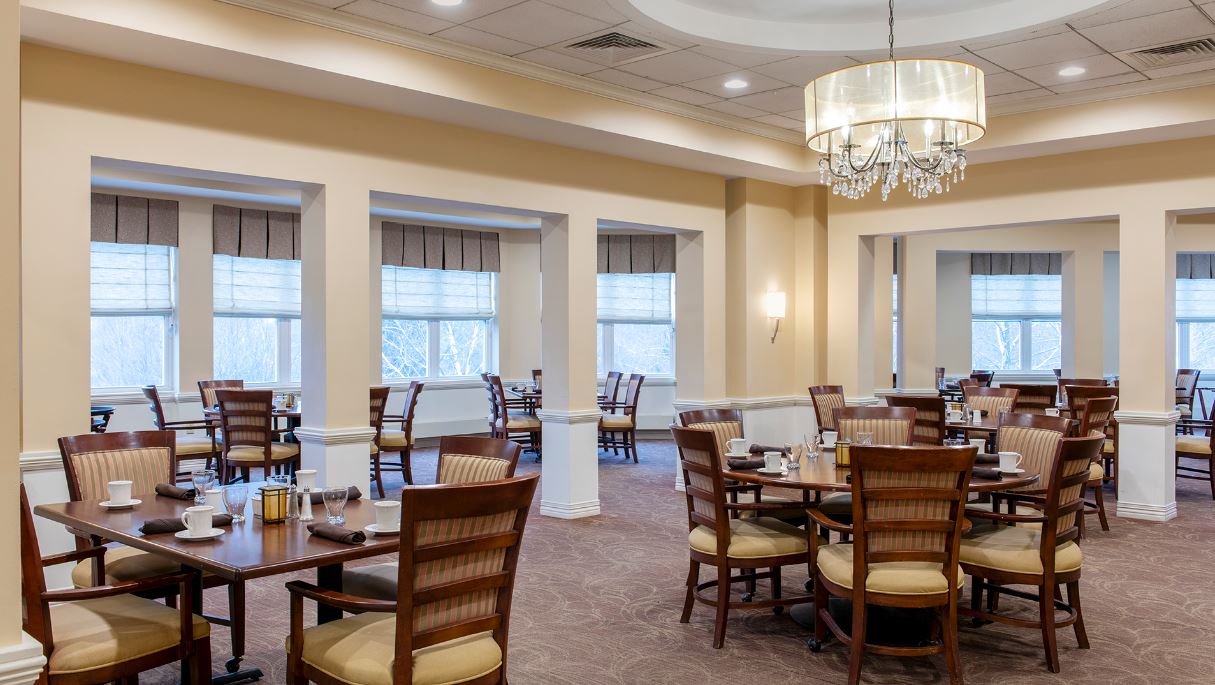 Modern dining area with tables and chairs