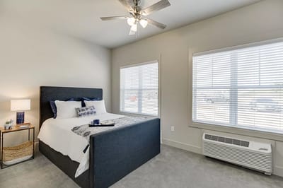 Cozy bedroom with natural light and modern decor
