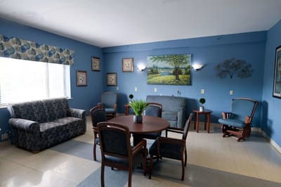 Bright common area with seating and artwork