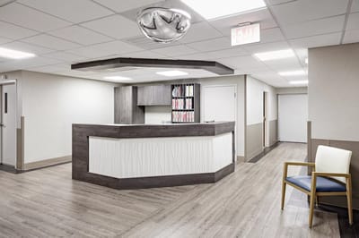 Reception area with a modern counter and decor
