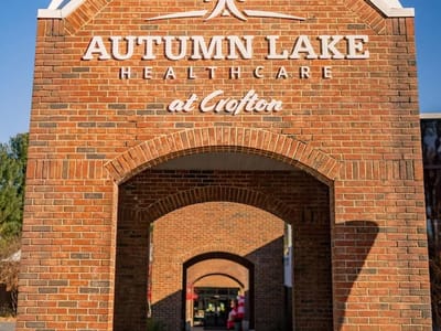 Brick entrance of Autumn Lake Healthcare at Crofton