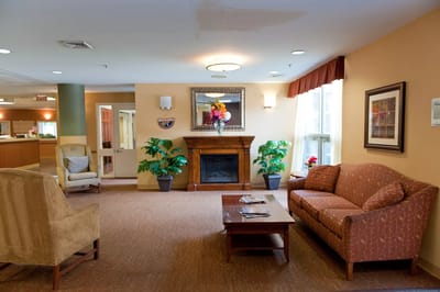 Cozy common area with seating and a fireplace