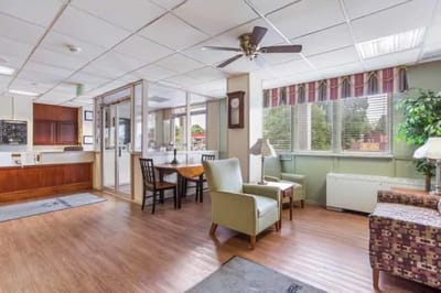 Bright common area with seating and natural light