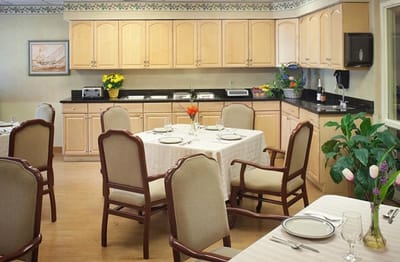 Dining area with elegant table settings in a well-lit room