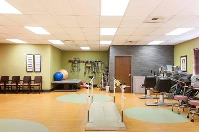 Rehabilitation exercise area with equipment and space
