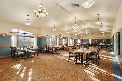 Bright and spacious dining room with tables