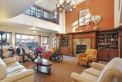 Residents and staff in a bright common area
