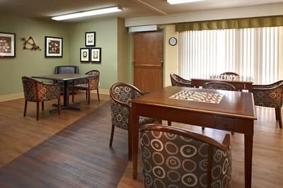 Bright common area with tables and chairs