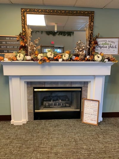 Decorated fireplace area in a common space