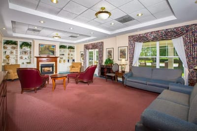 Cozy common area with seating and a fireplace