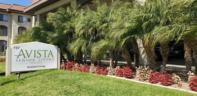 Exterior view of Avista Senior Living Magnolia with landscaping