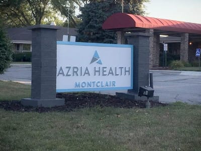The facility's logo and signage at the entrance