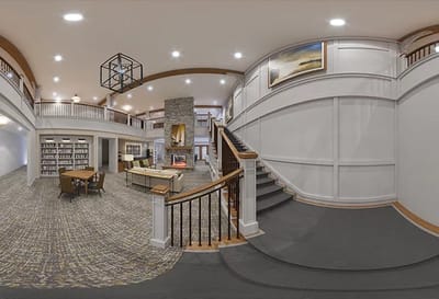 Interior view of a cozy library with seating