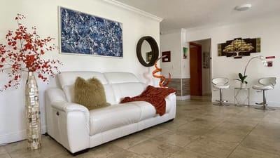 Bright sitting area with modern decor and furniture