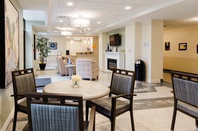 A welcoming interior common area with seating and decor