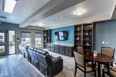 Interior common area with seating and TV