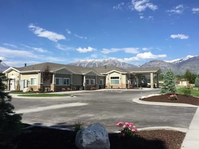 Exterior view of BeeHive Homes with mountains in background