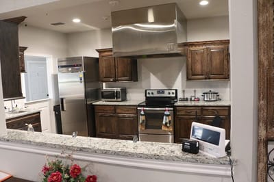 Clean kitchen area with modern appliances