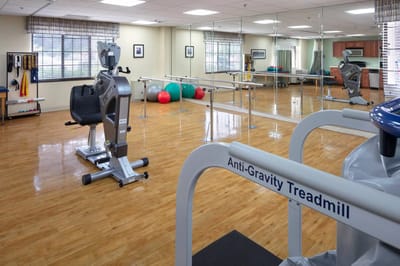 Interior view of a fitness area with equipment