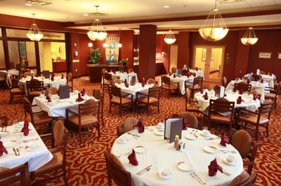 Dining room with elegantly set tables
