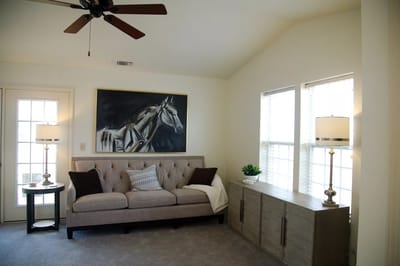 Cozy interior living space with a sofa and a painting