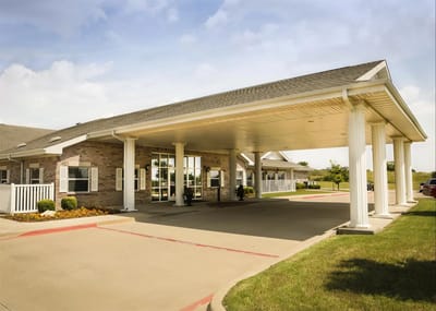 Front entrance of a senior living facility building
