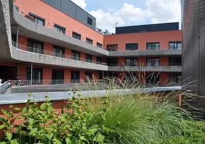 View of the facility's exterior with surrounding greenery