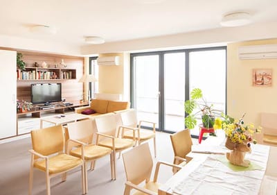 Bright living area with comfortable seating and decor