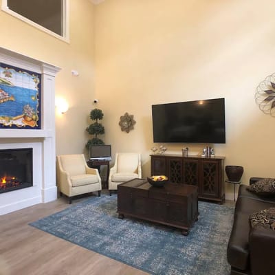 Cozy common area with seating and fireplace
