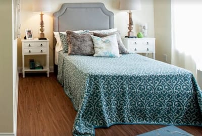 Cozy bedroom with a bed and decorative pillows