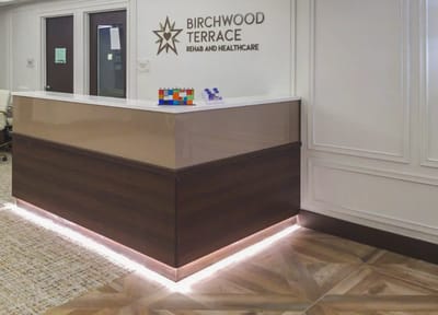 Reception area with Birchwood Terrace branding