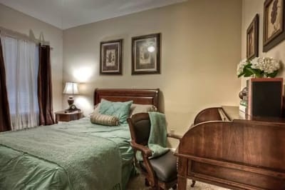 Cozy private bedroom with antique furnishings