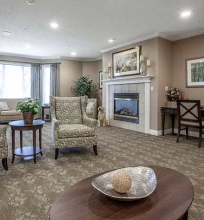 Common area with seating and a fireplace